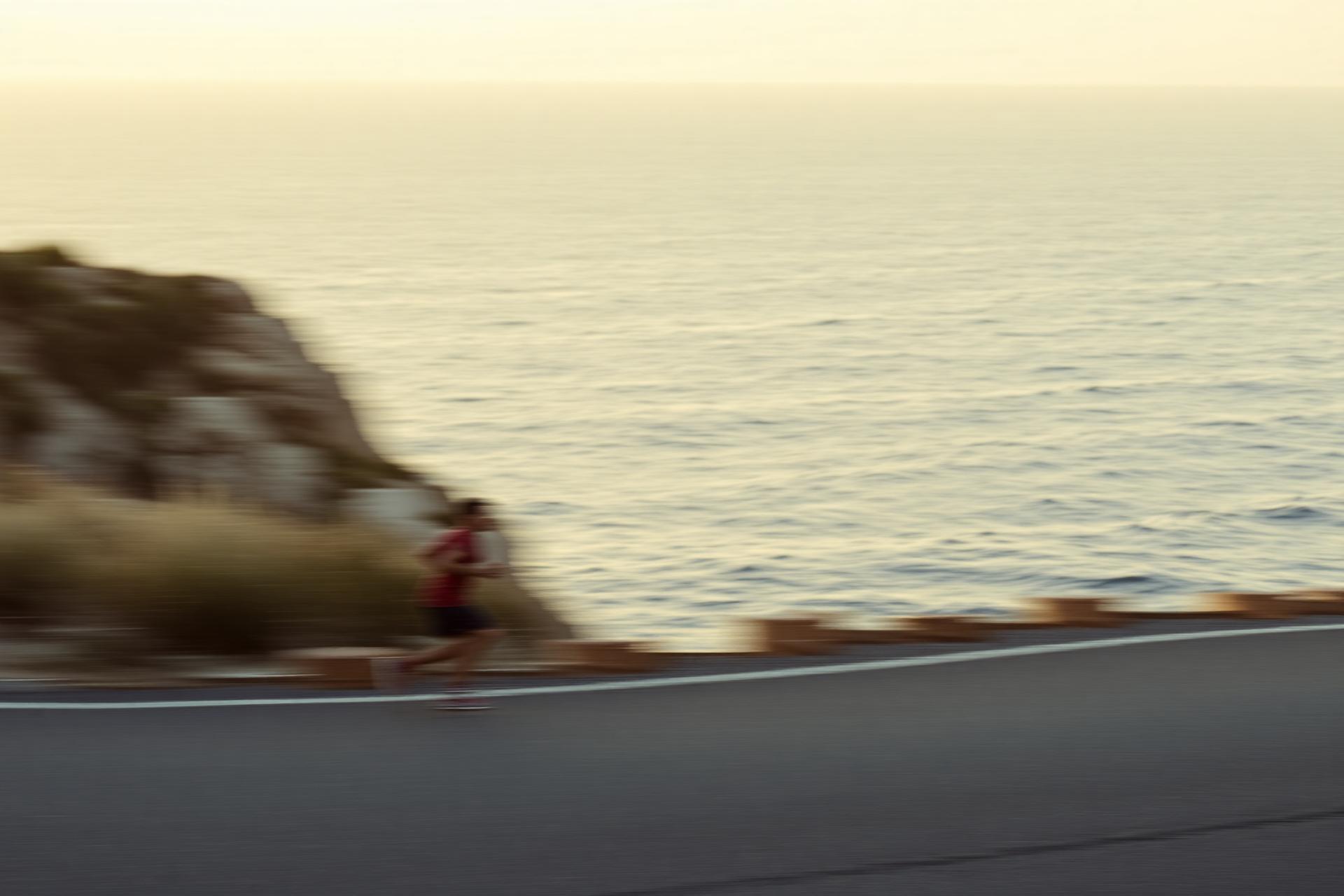 Runner along Costa del Sol coastline